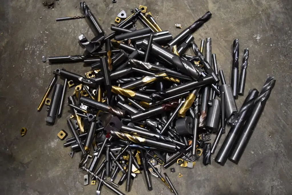 Pile of assorted drill bits and inserts